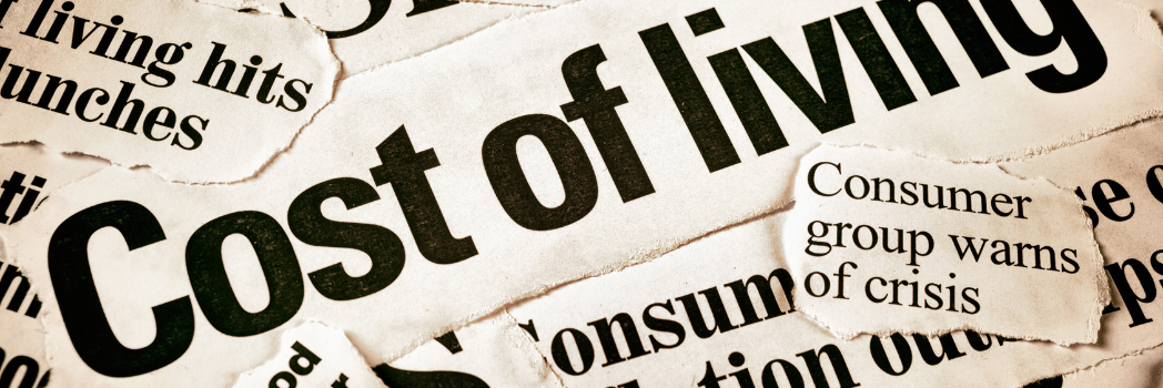 Newspaper headline reads: cost of living